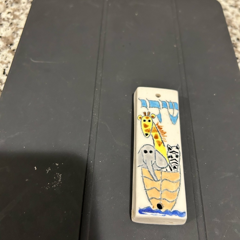 Mezuzah case Ceramic “ Noah’s Ark” 3 1/4” L x 1” W. White Background.